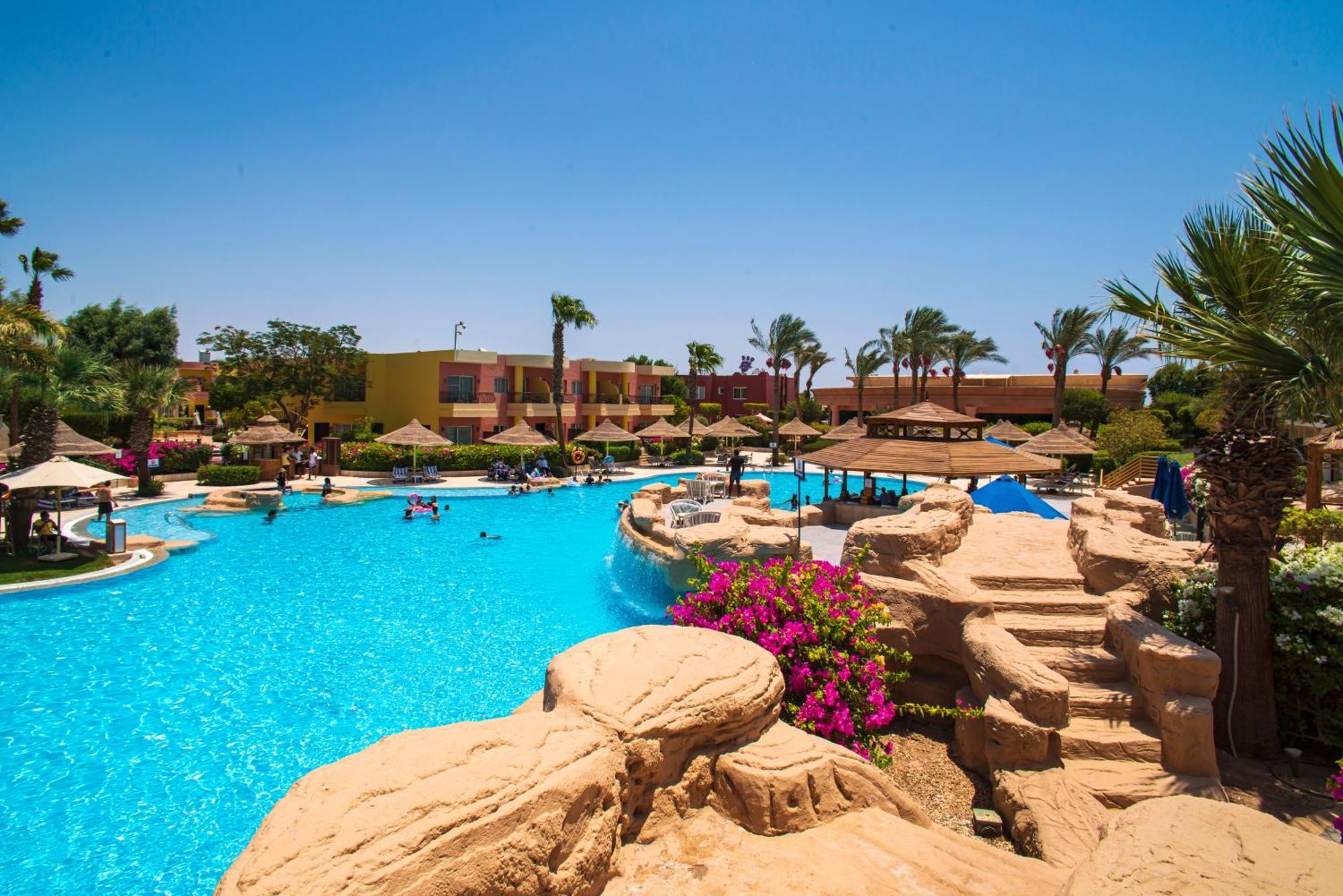 Sierra Sharm El Sheikh Hotel Екстериор снимка A swimming pool at a resort in Egypt