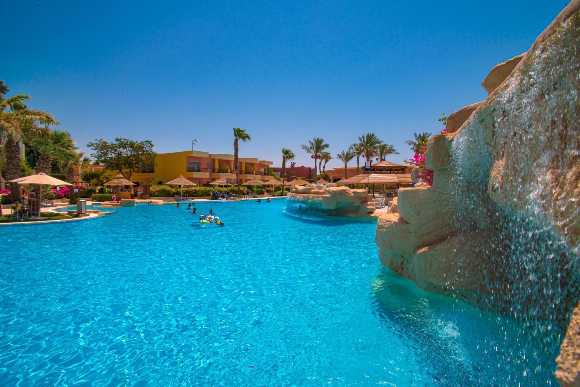 Sierra Sharm El Sheikh Hotel Екстериор снимка A swimming pool at a resort in Egypt