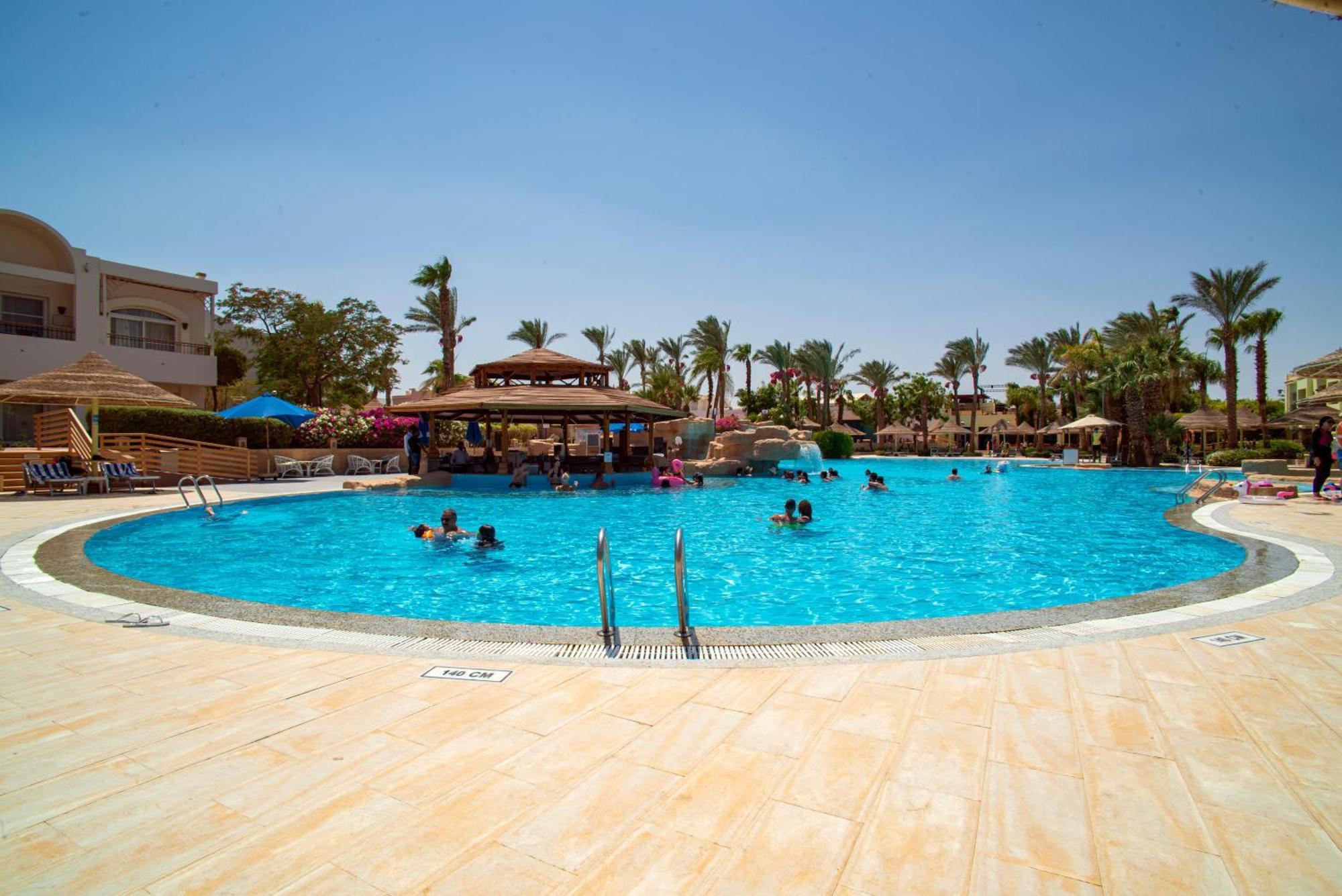 Sierra Sharm El Sheikh Hotel Екстериор снимка A swimming pool at a resort in Egypt